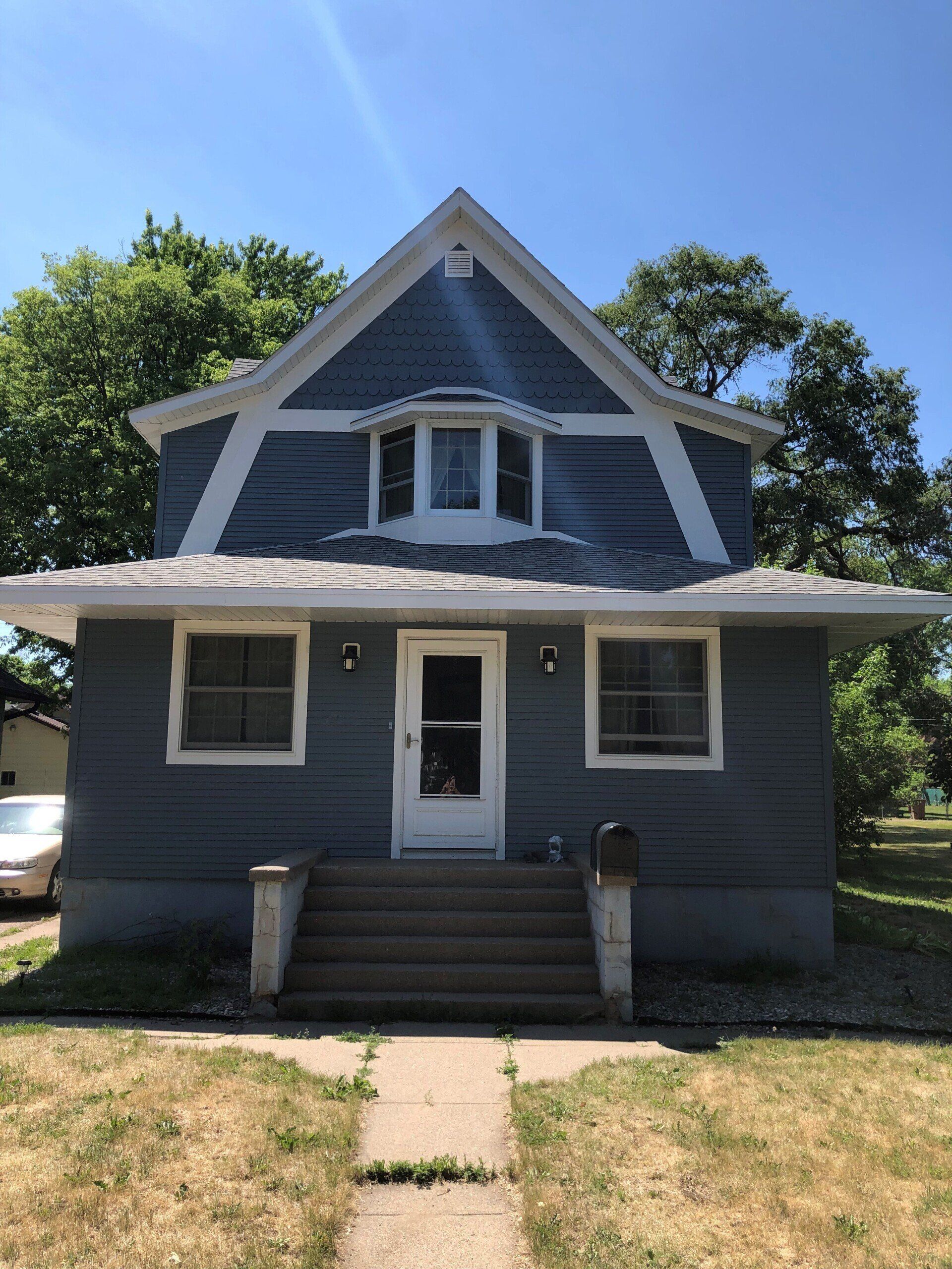 Same house after siding replacement by Even Construction