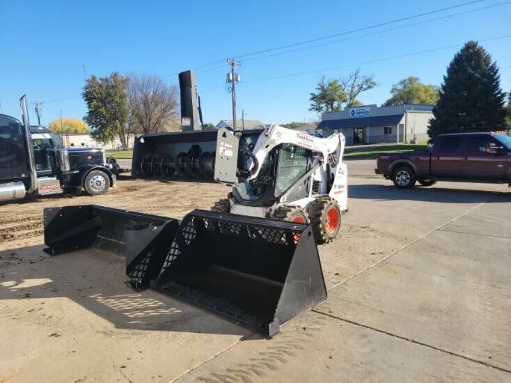 Even Construction snow removal equipment — Bobcat with snowblower attachment, Huron, SD